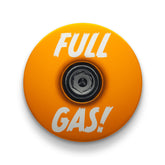 Orange headset top cap made from durable aluminum for cycling gear.