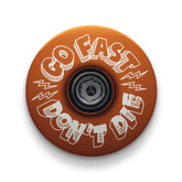 The brown bicycle headset top cover is perfect for personalizing your bike’s steerer tube.