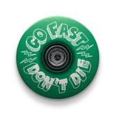 Green color custom bike stem cap designed for cyclists embracing the Go Fast Don’t Die lifestyle.