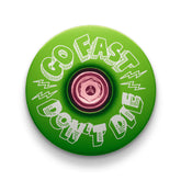 A lime green bicycle stem cap adds a vibrant accent to your bike’s headset assembly.
