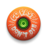 Orange bike headset cap crafted for durability and easy customization on your bike.