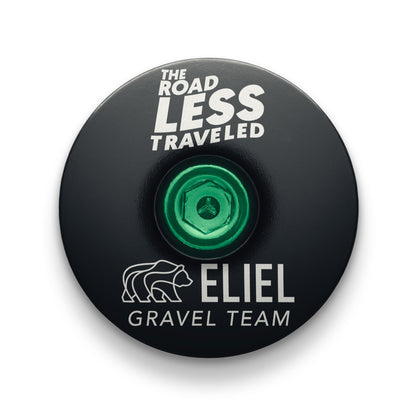 Black bicycle headset cap for gravel riders, perfect for custom bike builds and bike components.