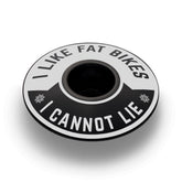 Black bicycle headset cap with "I Like Fat Bikes" design made for 1 1/8" steerer tubes.