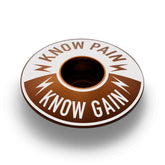 Brown Know Pain Know Gain headset cap, perfect for riders who value strength in their bike components.