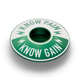 Dark green Know Pain Know Gain bike stem cap with durable 6061 aluminum construction.