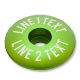 Lime green mtb bar end plugs with headset cap and bolt for unique bike customization.