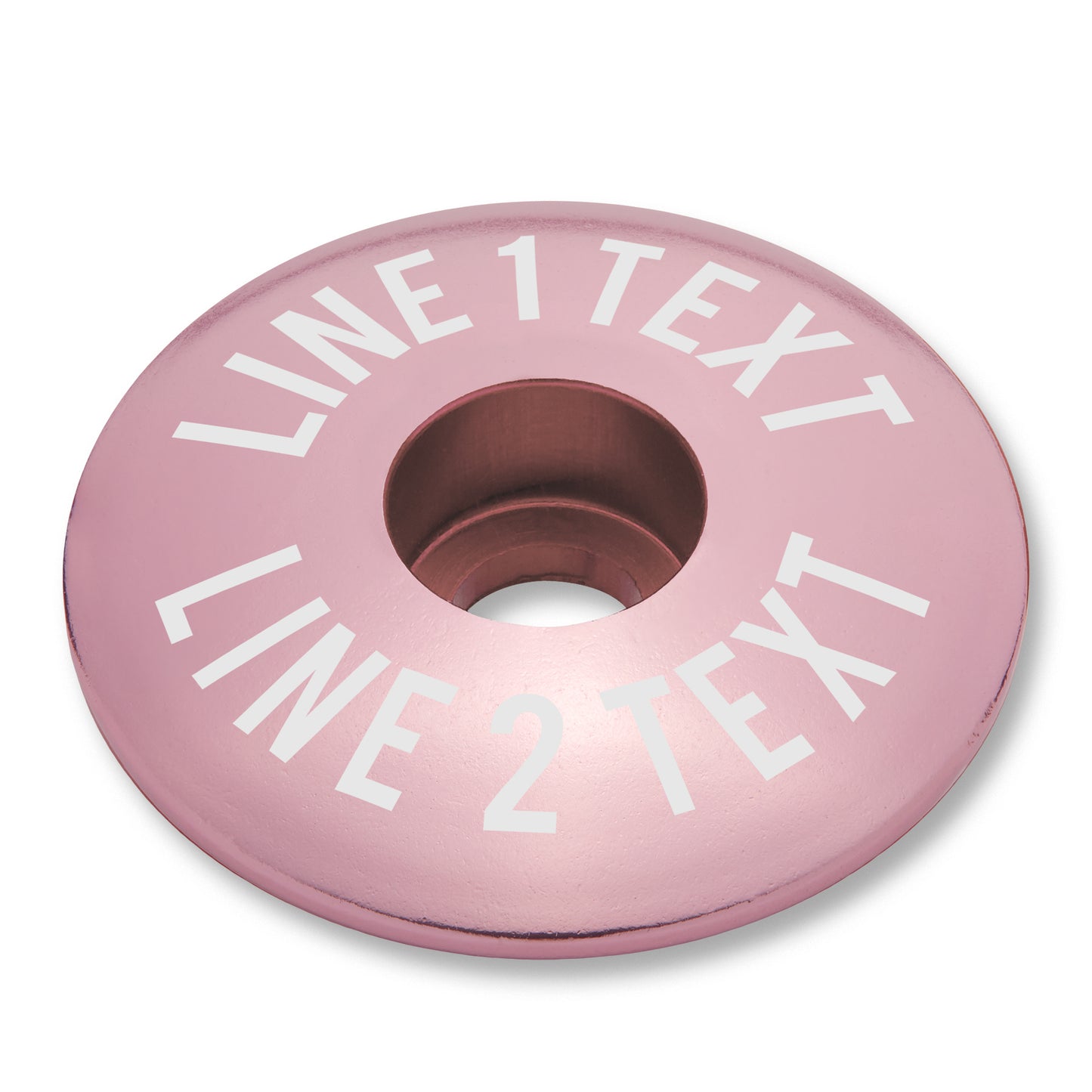 Pink bicycle bar end plugs and headset cap set for mountain or road bike personalization.