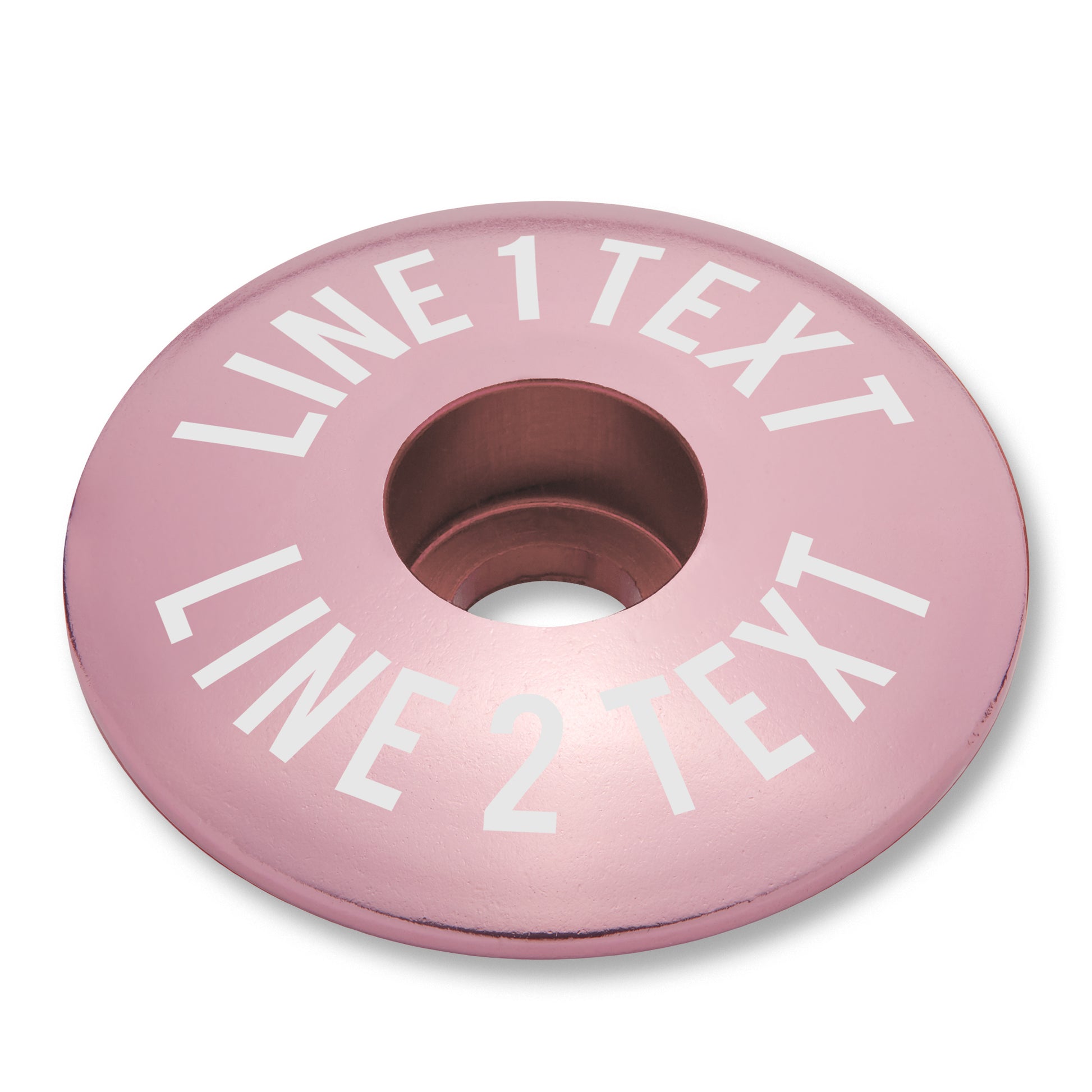Pink bicycle bar end plugs and headset cap set for mountain or road bike personalization.