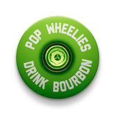 Lime green bike headset top cover for easy customization and lightweight design.