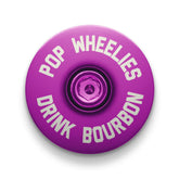 A purple bike stem cap adds a stylish element to your bike's headset.