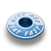 Blue Ride Ass Eat Fast bike headset cap for 1 1/8 steerer tubes adds personality to your bicycle top cap.