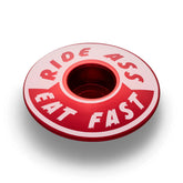 Red Ride Ass Eat Fast bike headset cap for 1 1/8 steerer tubes adds personality to your bicycle top cap.