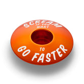 Orange bicycle headset cap, a perfect match for your mountain bike stem, is designed for easy customization.