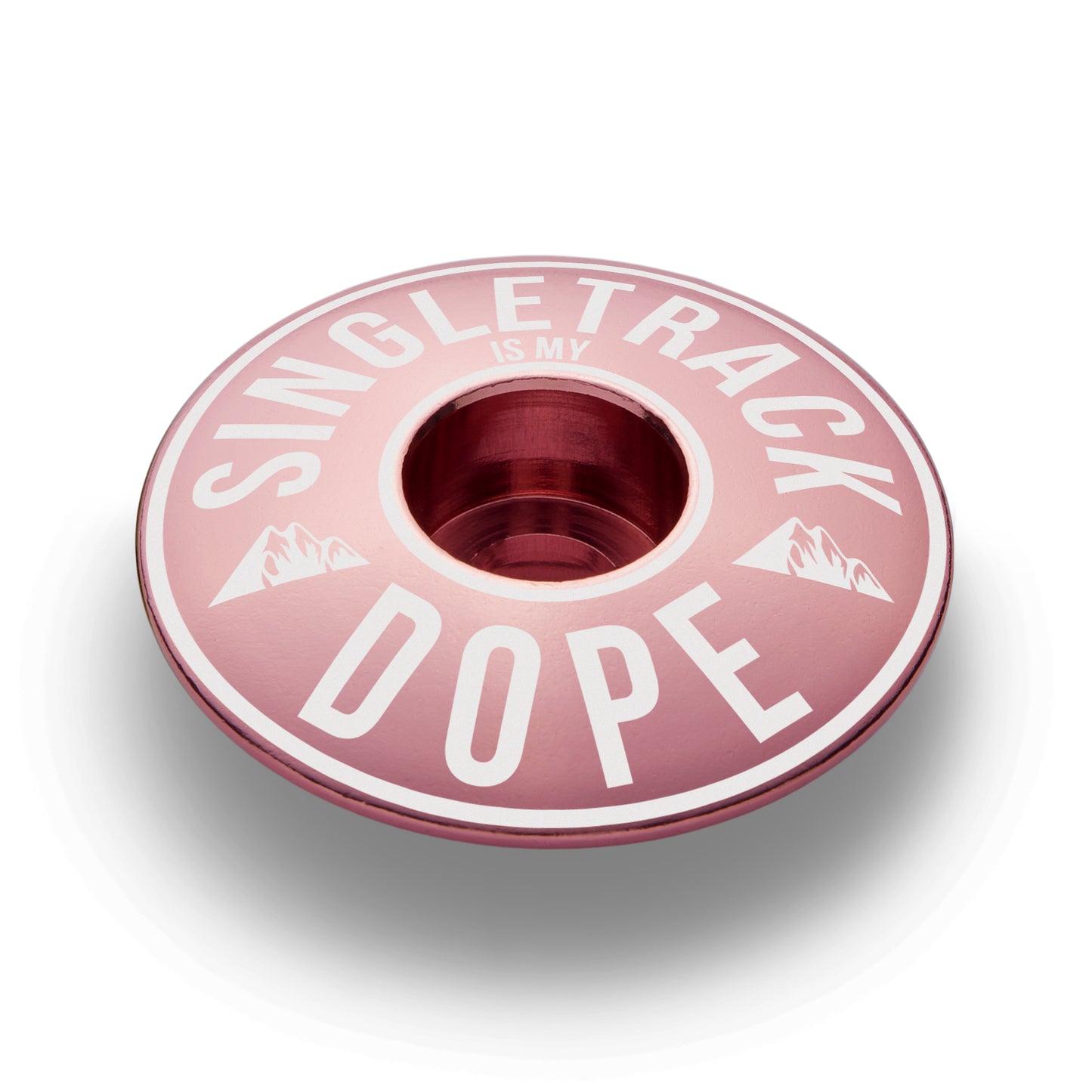 Pink bike headset cap custom designed for 1 1/8" steerer tubes adding style and strength.