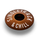 Brown bicycle headset cap lightweight aluminum upgrade for 1 1/8" steerer tubes.