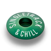 Dark green stem cap for bicycles durable aluminum design fits 1 1/8" steerer tubes.