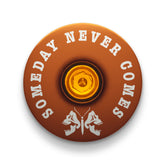 Brown bicycle headset cap with a death moth design for mountain bike customization.