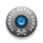 Gray bicycle headset cap with a death moth design for mountain bike customization.