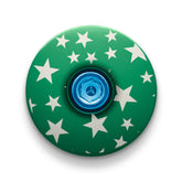 Dark green star-themed headset cap for customizing your bike with a personal touch.