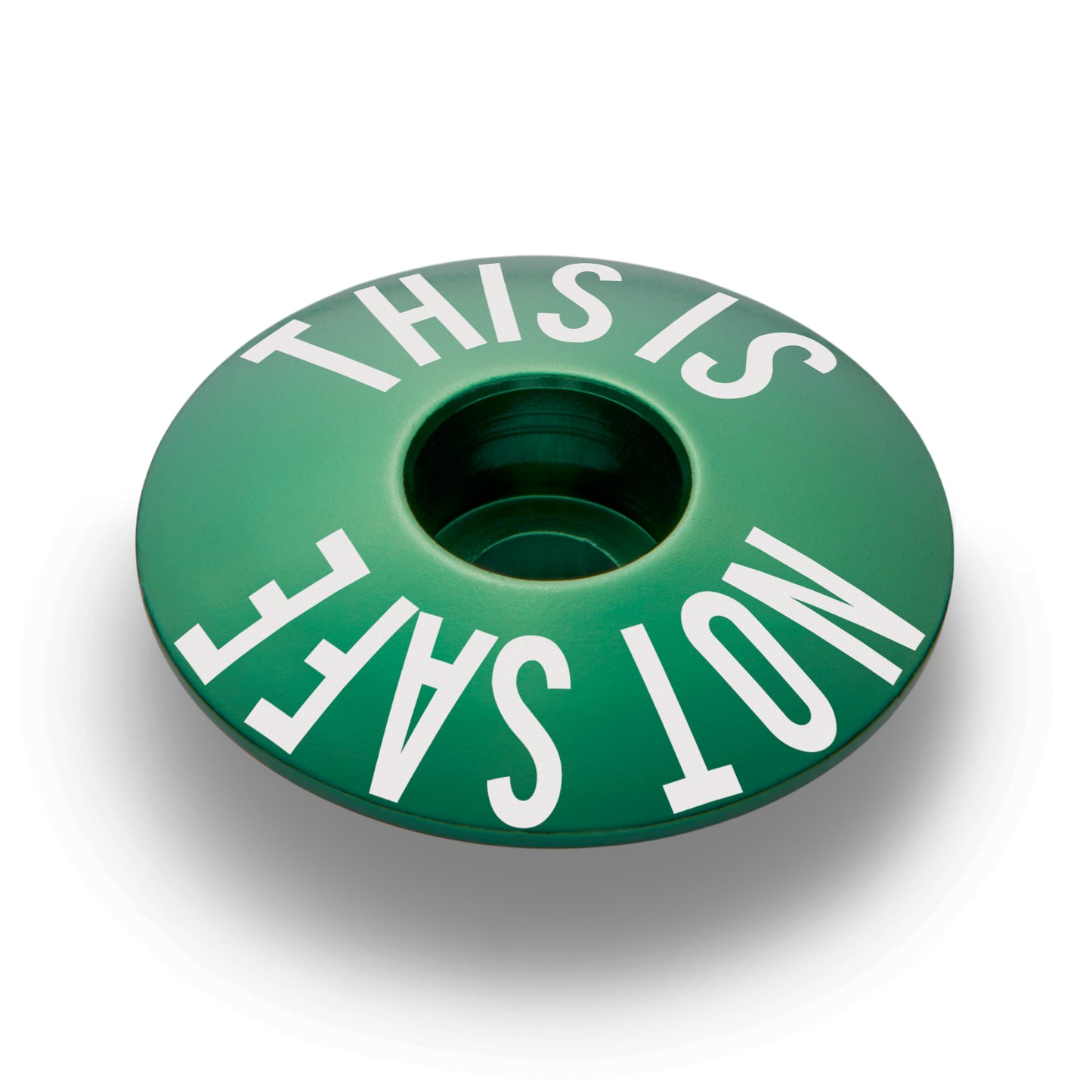 Dark green top cap for bikes with 1 1/8" steerer tubes.