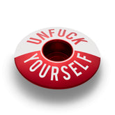 Red bike stem cap for 1 1/8-inch steerer tube crafted from lightweight 6061 aluminum with a bold design.