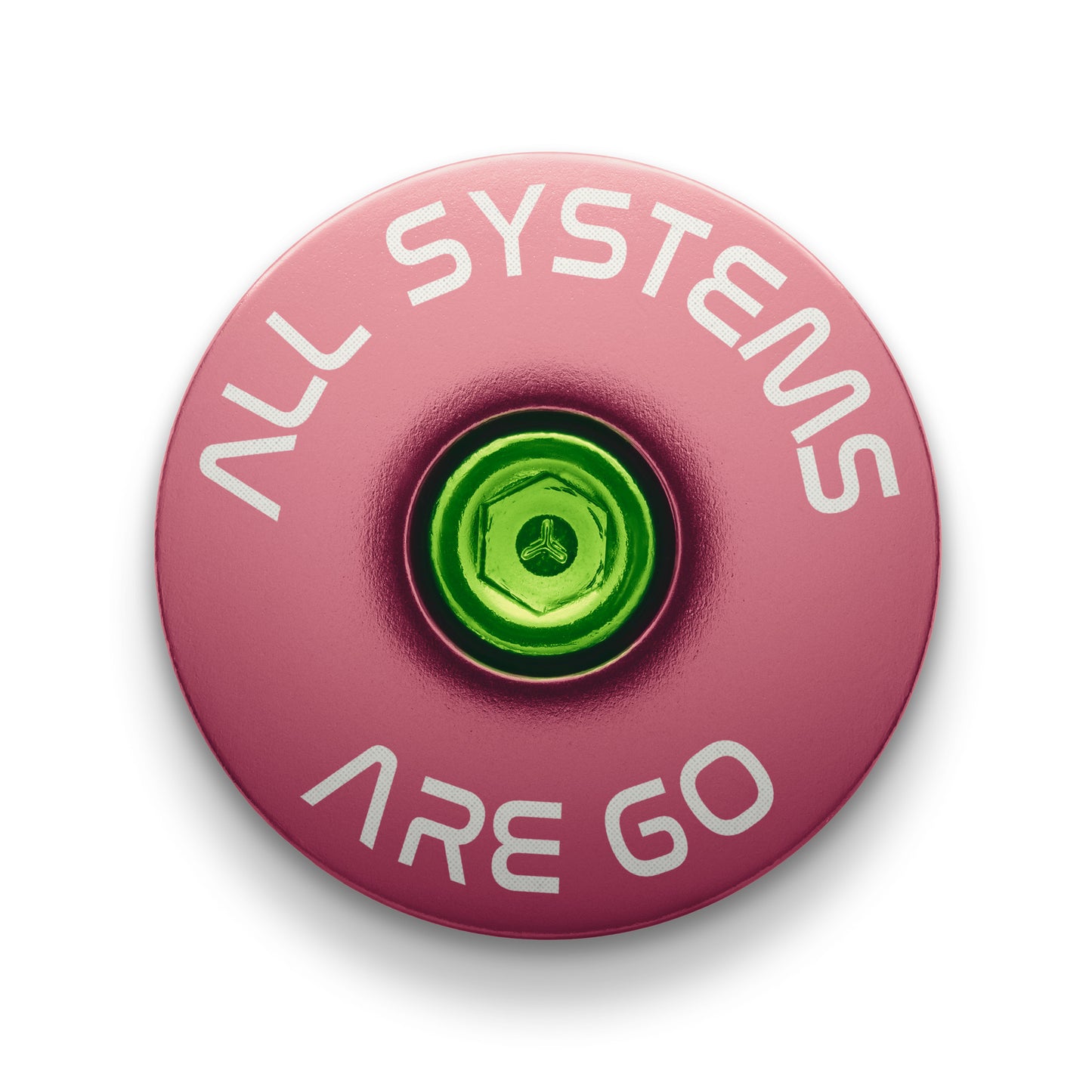 Pink bike headset cap with laser-engraved "All Systems Are Go" design for cyclists.